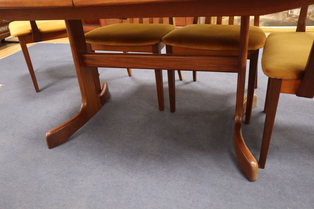 A G plan teak extending dining table, width 102cm, depth 106cm, height 69cm, six chairs and a sideboard